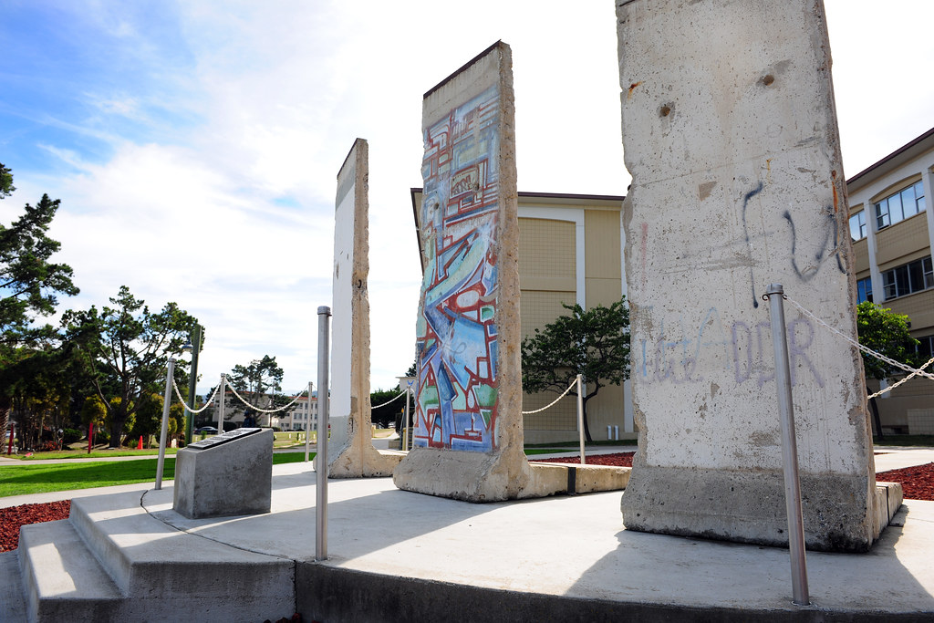 Caption: A secure memorial of three portions of the Berlin Wall, image sourced by Presidio of Monterey Public Affairs.
