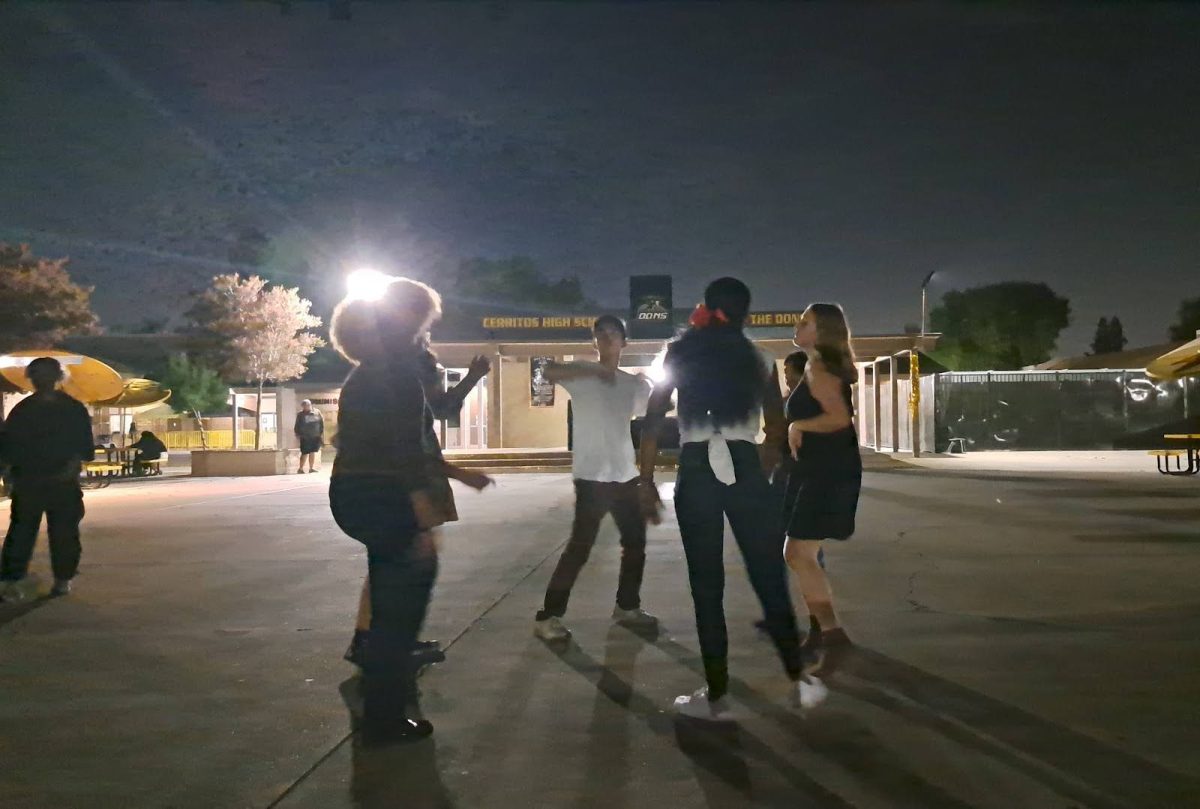 Students dancing along with the music