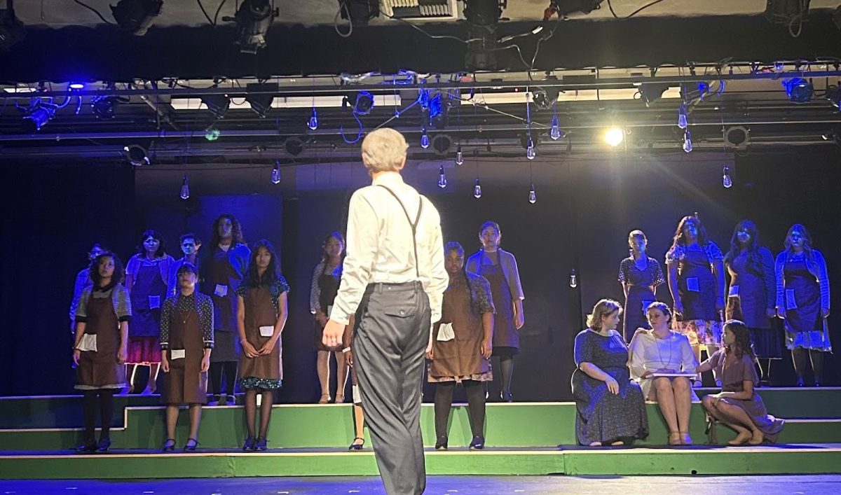 Tristan Parker as Arthur Roeder overlooking the Radium Girls