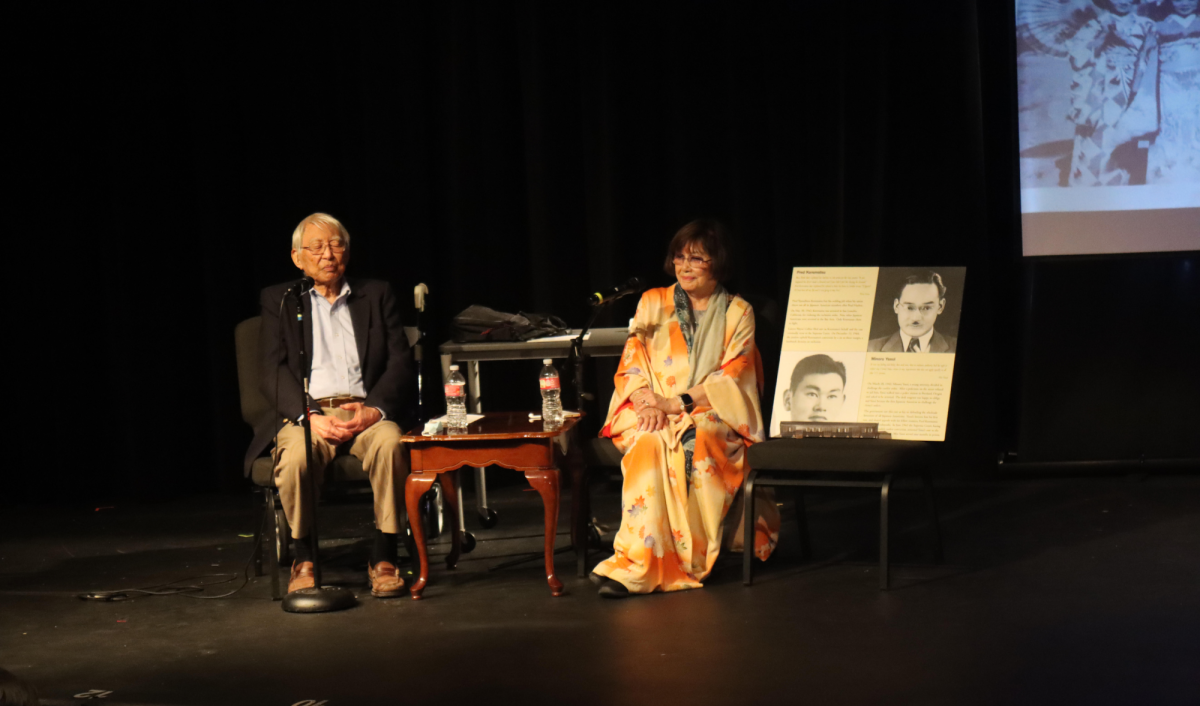 Guest speakers, Takashi Hoshizaki and June Aochi Berk, speak on the 1940s Internment camps of America where they were once confined simply for being Japanese. Photo by Sophomore Janold Blashard 