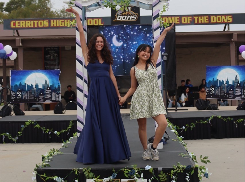 Juniors Reanna Sariñana and Jemiah Villasin catwalk in their Prom outfits. Photo by Janold Blanshard