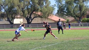 Senior Camille Mangahis strengthens her stance for a pass