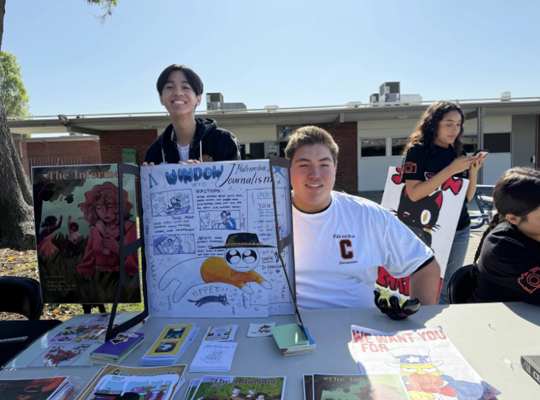 Senior, Zion Borriboonratana and Junior, Lorenzo Simental promoting Journalism at Tezlaff. Photo taken by Victoria Cienfuegos.