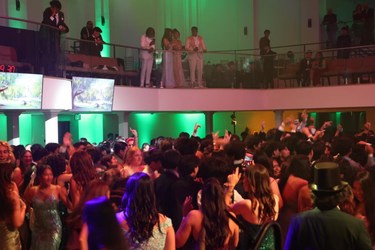 Students crowd the dance floor, dancing the night away. Photo taken by Janold Blanshard, used with permission.