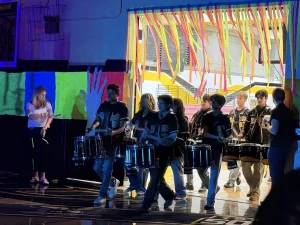 Drumline emerges from the East Gym with a fast-paced beat. Photo taken by Valentina Valdez